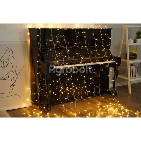 Karácsonyi fényfüggöny a zongorán